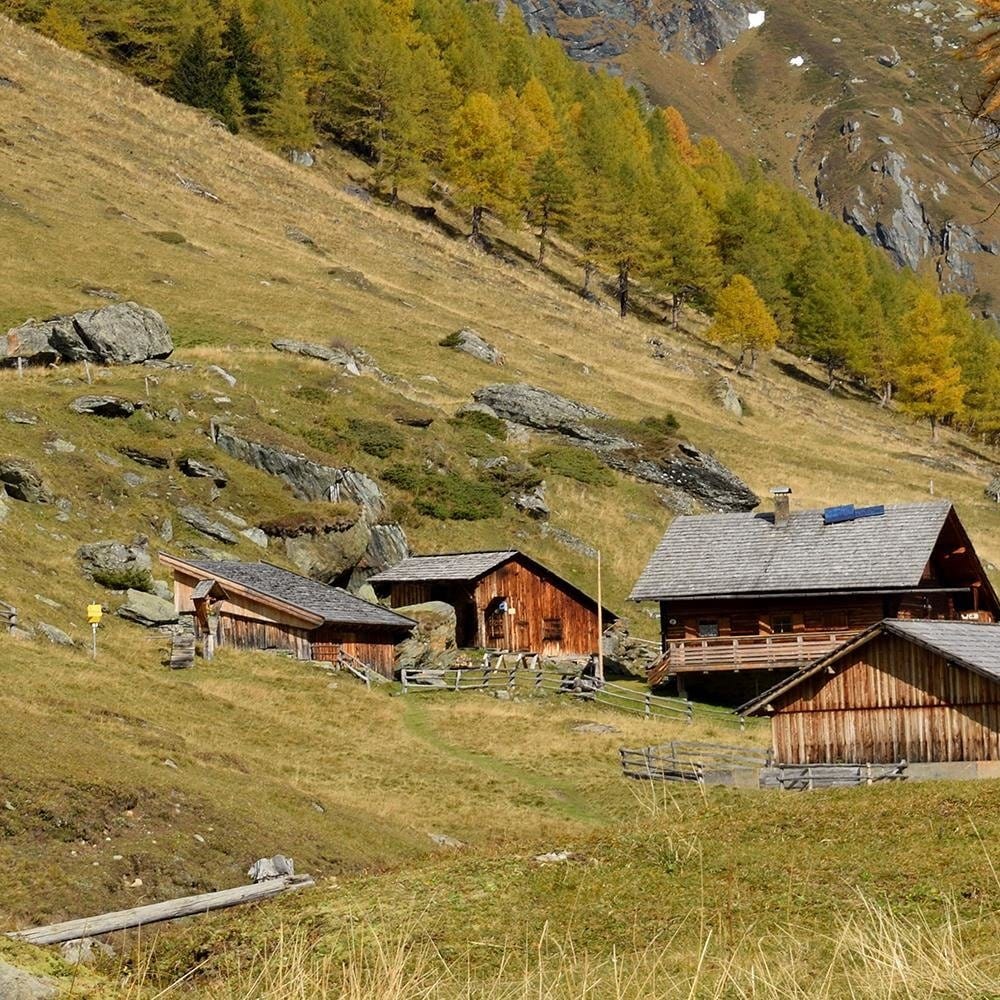 Glezna baltā rāmī - The Buildings At The Foot Of The Mountains  Home Trends DECO